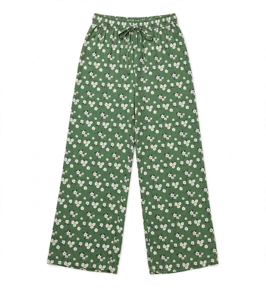 Olive green palazzo pants with a white daisy print and front tie waist