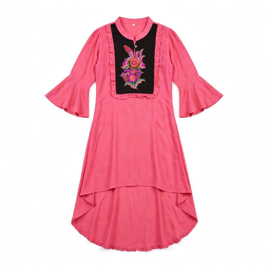 Girls' coral pink kurti with a black embroidered bib panel and ruffle trim