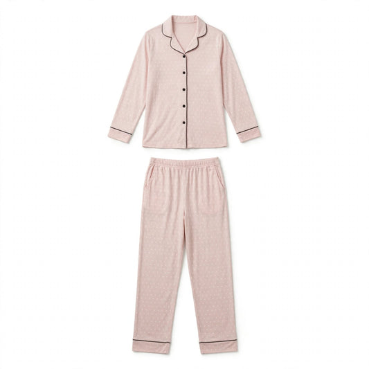 Blush pink polka dot pyjama set with black piping and matching trousers