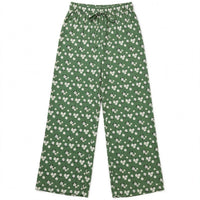 Olive green palazzo pants with a white daisy print and front tie waist