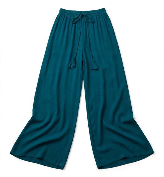 Teal wide-leg palazzo pants with a fluid drape and tasselled drawstring waist