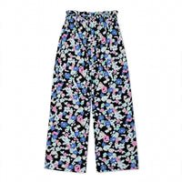 Black palazzo pants with a multicolour painterly floral print and paperbag waist