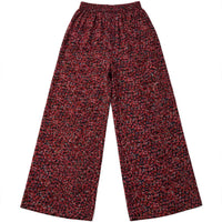 Maroon wide-leg palazzo pants in an all-over miniature floral print