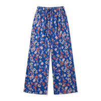 Royal blue palazzo pants with a tropical floral print and tasselled drawstring