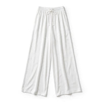 White wide-leg palazzo pants with an elastic waist and tasselled drawstring