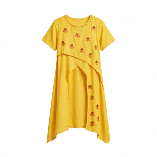 Girls' yellow layered kurti with marigold embroidery, asymmetric overlay and pom-pom trim